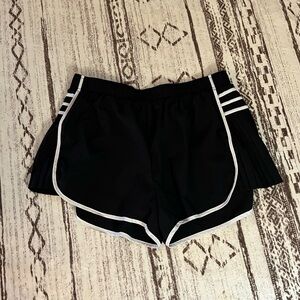 Black athletic shorts with white detail size lg